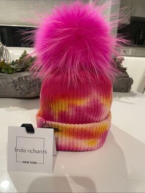 Linda Richard’s Tie Dye Wool Beanie with Raccoon Pom Pom
